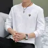 Camiseta de manga larga para hombre de otoño e invierno, sudadera tipo jersey holgada de cuello redondo, camisa base jacquard versátil de moda para hombre
