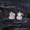 Brincos de Cabaça Kirin Heweisa Femininos Liu Shishi Mesmo Estilo Vermelho Chinês Pendente de Orelha Fritillaria Branca Ágata Vermelha Brilhante Brincos