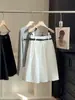 Saia plissada branca estilo universitário feminina verão nova cintura alta temperamento saia guarda-chuva petite cintura elástica saia midi fofa