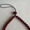 Suministro del Fabricante de Cadena para Teléfono Móvil de Cinabrio con Bajo Contenido del Año Zodiacal Femenino Exquisita Cadena para Teléfono Móvil con Cuentas de Mineral Crudo Arena Dorada Púrpura Anti-Pérdida