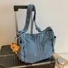 Mochila Escolar Cruzada de Mezclilla 2026 Otoño Nueva Gran Capacidad Simple para Estudiante Bolso Cruzado de un Solo Hombro