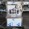 Máquina semiautomática de llenado de fertilizante líquido de 4 cabezales, Equipo de llenado de fertilizante líquido anticongelante, Máquina de llenado de urea para vehículos de acero inoxidable