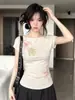 Camiseta beige de manga corta estilo coreano para mujer, estampado floral de verano, corte ajustado, versátil para ir al trabajo, top moderno