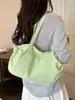 Bolsa de Ombro Grande Capacidade Transfronteiriça para Mulheres 2026 Nova Tendência Estilo Coreano Bolsa Tote para o Dia a Dia Cor Sólida Versátil Bolsa de Mão Bolsa de Ombro