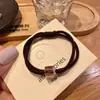 Elástico de Cabelo Quadrado Clássico Cristal Duas em Uma Simples e Elegante Cor Café com Leite Temperamento de Nicho Acessório de Cabelo Versátil para Amarrar Corda de Cabelo para Mulheres