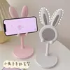 Soporte para Teléfono Conejito Pequeño Elevador Ajustable para Escritorio Soporte de Apoyo Perezoso para Selfies y Transmisiones en Vivo Lindo Dibujo Animado Soporte para Maratones de Series