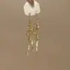 Pendientes Dorados con Línea de Palacio y Diamantes Brillantes, Aretes de Borla de Flor Hueca para Mujer, Estilo Largo Otoño e Invierno, Pendientes para Mujer que Adelgazan el Rostro