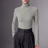 Base de punto de alta calidad, hilo Yangzi finamente hilado, 100% lana, suéter de cuello alto para mujer con silueta ajustada