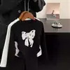 Camiseta con Lazo para Niñas Dulces 2026 Nuevo Estilo Versátil de Manga Larga para Niños Camiseta Básica de Principios de Primavera y Otoño