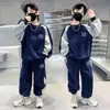 Ropa de niño otoño traje de niño otoño manga larga suéter de dibujos animados pantalones casuales ropa deportiva para niños conjunto de dos piezas