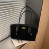 Bolso color marrón melardo para otoño e invierno, bolsa de mano de gran capacidad para mujer, adecuada para el trabajo y los desplazamientos, bolso de hombro elegante y con estilo.