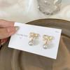 Pendientes colgantes con diseño de nicho, elegantes y sencillos, con broche de plata S925 y lazo de perla de Corea del Sur.