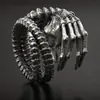 Europa y Estados Unidos joyería transfronteriza estilo punk locomotora anillo de calavera y garra dominante para hombre anillo popular exagerado de personalidad