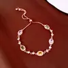 Pulsera Colgante Flor Trébol de la Suerte Zirconia Perla Lujo Ligero Sensación de Alta Gama Pulsera Vintage Versátil Joyería de Mano
