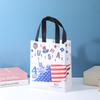 Bolsa TNT revestida com filme de estoque bandeira americana bolsa tridimensional bolsa de proteção ambiental prensada a quente transfronteiriça logotipo impresso bolsa para presente