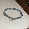 Pulsera de perlas con nariz de cerdo de circón vintage estilo francés, sensación de lujo ligero y alta gama, versátil, elegante, única y a la moda