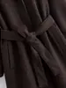 Exportación Transfronteriza 2025 Nueva Moda Otoñal Versátil Color Sólido Lana Delgado Solapa Con Cordones Lana Largo Abrigo para Mujer