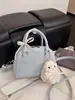 Bolsa de Mão Versátil Cor Sólida Simples Estilo Novo Primavera e Verão para Mulheres, Textura Elegante e de Alta Qualidade, Bolsa Transversal Elegante para o Dia a Dia