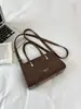 Bolso Cubo de Nicho Estilo Coreano para Mujer 2026 Primavera Nuevo Bolso de Hombro Retro para Viajar Bolso Cruzado Casual Diario