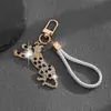 Llavero de Moda Europeo y Americano de Lujo con Pedrería Completa Personalizado Tendencia Forma de Leopardo Dorado para Hombre Llavero Colgante para Bolso Accesorio