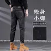 Jeans skinny ajustados de moda de marca de Hong Kong para hombre, elásticos, pantalones casuales de invierno para hombre, forrados de felpa y engrosados