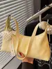 Bolso de axila de estilo coreano moderno para mujer 2025 Verano Nuevo Casual Simple Estilo Suave Bolso bandolera de un solo hombro