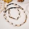 Conjunto de collar y pulsera ajustable con cuerda de cera de concha de estilo bohemio tejido a mano entre Europa y Estados Unidos