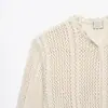 Venta al por mayor transfronteriza 2026 Moda europea y americana casual simple de un botón botón oculto tejido de malla cárdigan ropa de mujer A37328