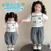 Conjunto de Ropa para Niñas 2026 Nuevo Conjunto de Moda Estilo Coreano para Niñas Pequeñas, Conjunto de Dos Piezas con Estampado de Gato y Pantalones de Cuadros Blanco y Negro para Niños Pequeños y Niños Pequeños