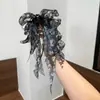 Elegante Pin de Borla de Loto Reductor de Edad de Alta Gama Acrílico Versátil Uso Diario Retro Popular Accesorios para el Cabello para Mujeres