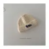 Nuevo Gorro de Punto para Niños de Nicho Otoño e Invierno 2025 Estilo Coreano Color Caramelo Logo de Letra Versátil Gorro de Punto para Bebé