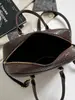 Otoño 2026 Nuevo Color Sólido Personalizado Elegante Bolso Almohada de Mano Alto Valor Nicho Retro Textura Tejida Bolso Cruzado