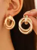 Pendientes geométricos exagerados transfronterizos para mujer, estilo Ins, de aleación europea y americana, con giro envolvente, pendientes de aro retro.