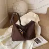 Bolsa para lonchera de axila relajada coreana nicho retro patchwork de gamuza bandolera de un solo hombro bolso de bola de masa estampado de leopardo moderno