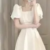Verão 2024 Novo Francês Primeiro Amor Vestido Longo Branco Feminino Emagrecedor Pequeno Fresco Elegante Vestido de Manga Curta Transfronteiriço