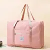 Nueva bolsa de almacenamiento para maternidad de gran capacidad para guardar edredones, conveniente para viajar, se puede acoplar a una maleta de ruedas para viajes de negocios y de placer.