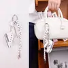 Colgante Original Hecho a Mano Serie Miu Bolsa de Cuerda Tejida a Mano Llavero Regalo Versátil para Pareja Fábrica Puede Ser Vendido al por Mayor