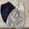 Calça de Moletom Esportiva de Outono para Meninos 2026 Novo Estilo Bebê Estilo Coreano Joggers Roupa Infantil Calças Casuais Simples Versáteis