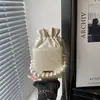 Bolso de Mano de Perlas Coreanas para Mujer 2026 Nuevo Otoño/Invierno Bolso de Hombro Único Cruzado de Moda de Gama Alta Bolso Cubo Versátil