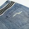 Calça jeans destroyed com patches rasgados, estilo streetwear americano masculino, calça longa solta de perna larga, calça reta color-block, dad jeans