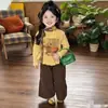 Ropa para niños para niñas, conjunto de dos piezas de camiseta de dibujos animados de manga larga y pantalones largos, talla 26, nuevo estilo primavera y otoño, suministro de fábrica de comercio exterior