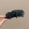 Nuevo y exquisito pasador de pelo con lazo 2026, un accesorio lujoso y de alta gama, con un diseño de pinza de plátano estilo coreano, creando un look dulce y moderno para mujeres