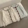 Elegante estilo coreano suave doce em forma de coração redutor de idade gola boneca trança retrô preguiçoso cardigã tricô suéter feminino