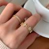 Anillo de circonita de estilo coreano con diseño de nicho para mujer, elegante, de alta gama, delicado y abierto, estilo frío.