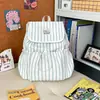 Mochila Feminina Listrada Simples e Fresca 2026 Nova Moda Tendência Mochila Escolar para Estudante Mini Mochila para o Dia a Dia