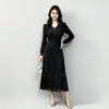 Vestido largo elegante plisado para mujer transfronterizo con flecos estilo Miyake, mangas largas tipo linterna, cintura de pétalos, empalme de encaje y diseño plisado