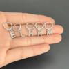 26 letras inglesas aretes dorados y plateados aretes aretes personalidad aretes de cartílago joyería de piercing europea y americana aretes