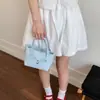 Bolso Cubo de Moda 2026 Primavera Nuevo Estilo Simple y Lindo Moño Elegante Bolso de Hombro Gran Capacidad Bolso para Viajes