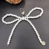 Nuevo Colgante de Lazo de Amor Plateado para Funda de Teléfono Móvil Llavero Colgante Versátil Exquisito Regalo Pequeño Accesorios para Equipaje