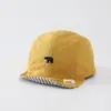 Sombrero de color sólido versátil para bebé con ala suave al por mayor nuevo sombrero solar transpirable para niño pequeño gorra de béisbol linda de cachorro para bebé